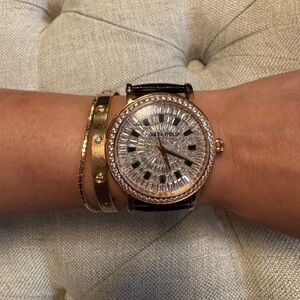 Luxurious Rose Gold and Black Women's Automatic Watch with Crystals.